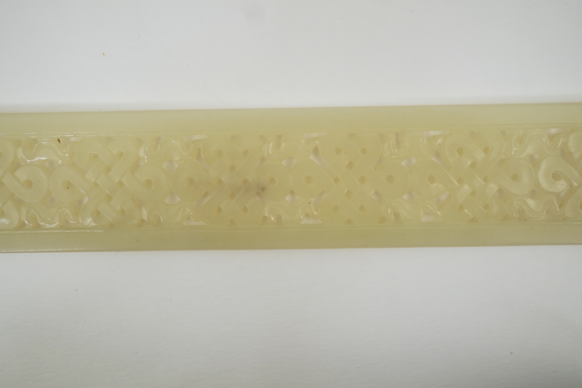 A Chinese pale celadon jade scroll weight